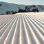 Kitzbühel Winter Hahnenkamm Panorama (c) Kitzbuehel Tourismus (13) Frisch präparierte Pisten im Skigebiet Kitzbühel unter klarem Himmel.